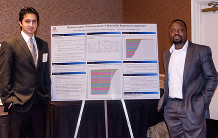 grad students with research poster