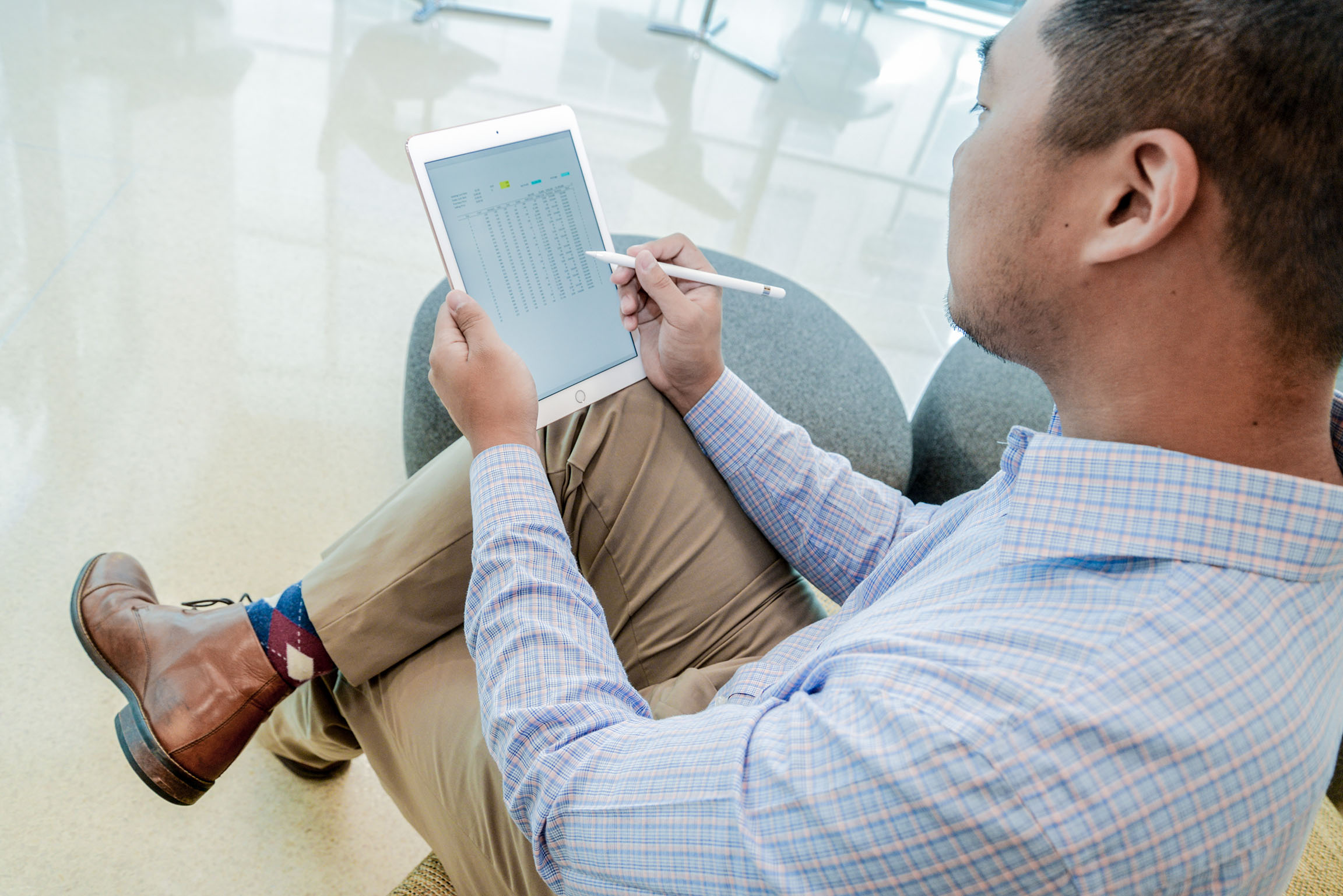 man holding a tablet