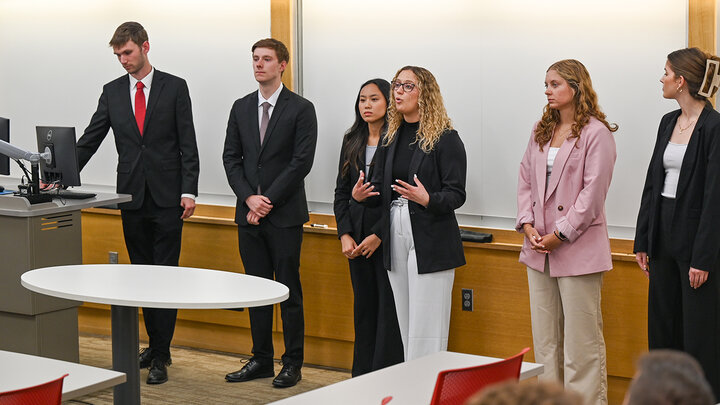 students presenting their capstone project