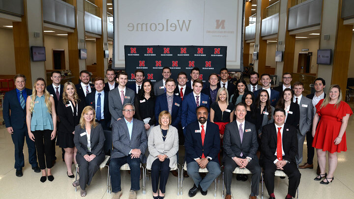 Sales certificate recipients pose with faculty and program supporters for a group photo after the awards ceremony.