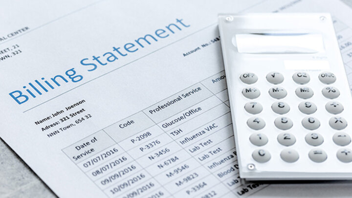 Picture of Calculator and Financial Statement