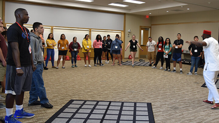 Dr. Osiri leads students in global thinking exercise
