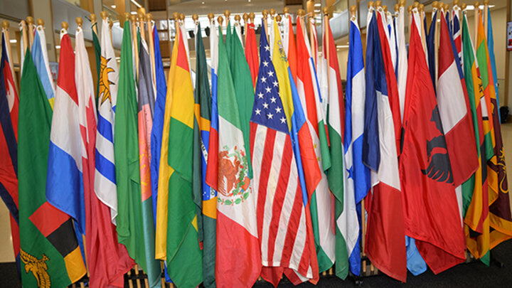 During International Education Week, flags representing the home nations and territories of Nebraska Business students adorn the Henrickson Family Atrium.