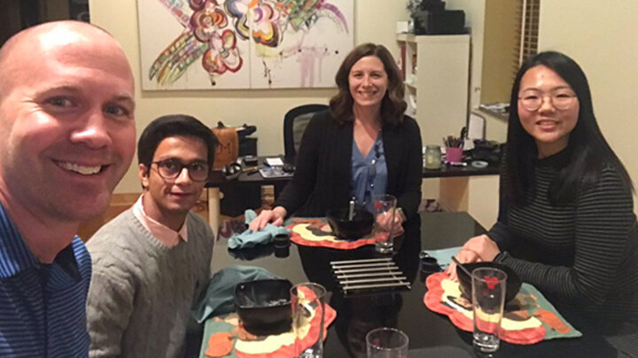 Dr. Laurie A. Miller and her husband hosted two students for Thanksgiving.