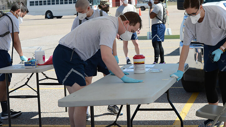 Nebraska National Guard members with the 155th Medical Group prepare a worksite for COVID-19 testing in Grand Island on April 7. The medical group, which includes Gabe Chase, is part of the Chemical, Biological, Radiological, Nuclear and Explosive Enhanced Response Force Package team.