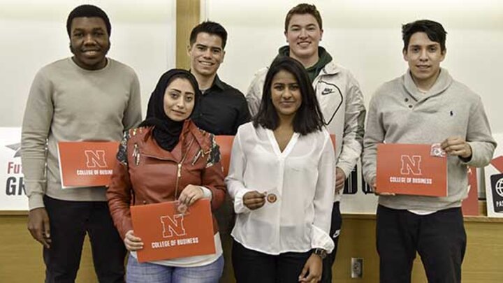 Nine Nebraska Business students achieved medallions for the first semester of the program.
