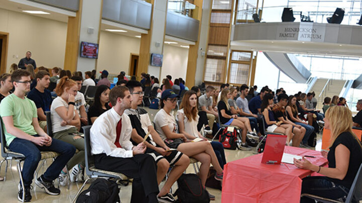 Students gathered in the Henrickson Family Atrium to listen to various accounting professionals.