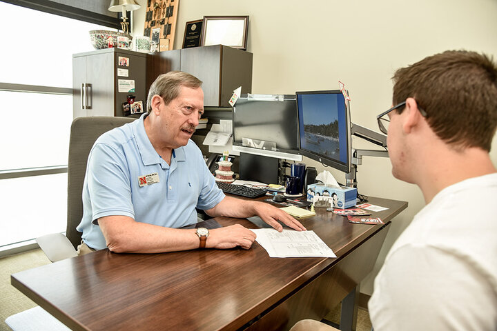 Student feedback highlighted Burdic’s ability to care and help them plan their college path, as well as instill confidence. Photo taken prior to COVID-19 pandemic.