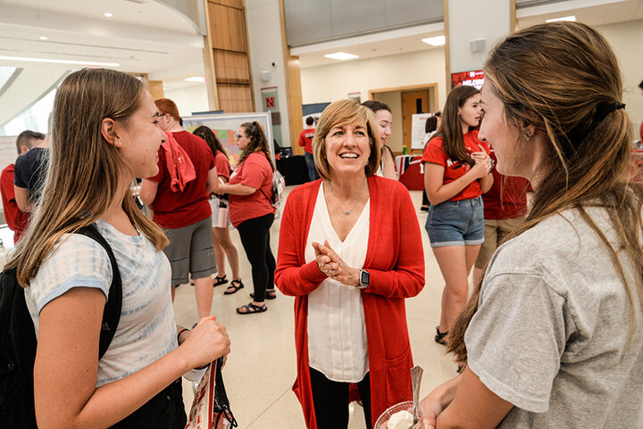 Dean Kathy Farrell connects with students at the 2019 Back to School Bash. The event provides a fun atmosphere for students to engage with alumni, faculty, staff and business partners.