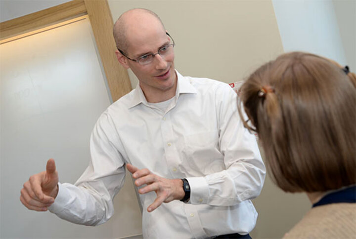Baugh instructs Nebraska Business Honors Academy students to better prepare them for long-term investing success.