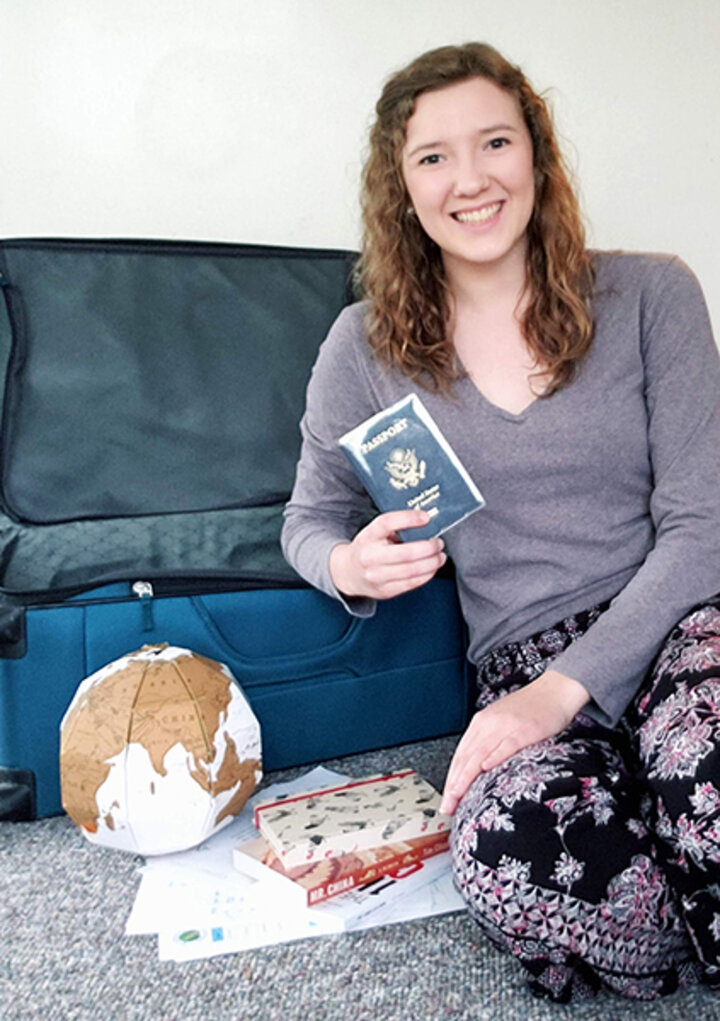 Christy Cooper’s suitcase isn’t packed yet, but her passport is ready.
