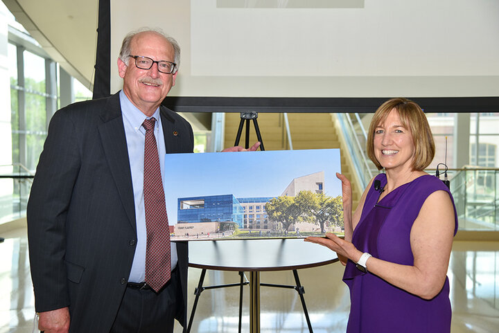 Dr. Kathy Farrell, James Jr. and Susan Stuart Endowed Dean of the College of Business, recognized Schmidt’s retirement at the college’s annual faculty and staff awards reception.