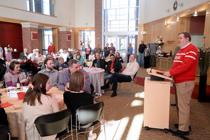 Gentry addressing the audience at his retirement reception in the Van Brunt Visitors Center.