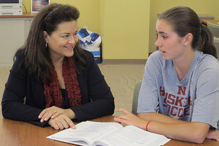 Donna Dudney with a student