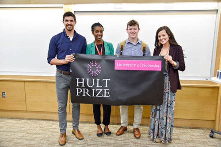 Winning team Uhusiano pose with Gloria Mwiseneza (second from left).