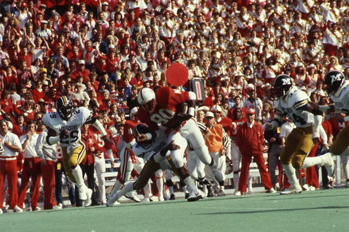 Williams played tight end at Nebraska and in the NFL for more than 10 years, where in addition to on-field accomplishments he also holds the distinction as the first pro to wear dreadlocks.