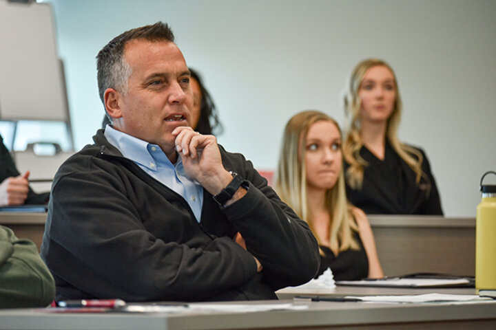 Dan Lambe, president of the Arbor Day Foundation, asked the students questions about their business pitches.