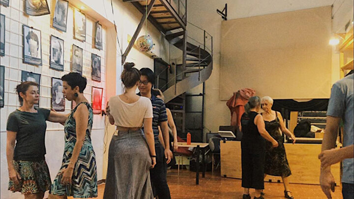 Nebraska Business students Quan and Ariel go over the basics of tango.