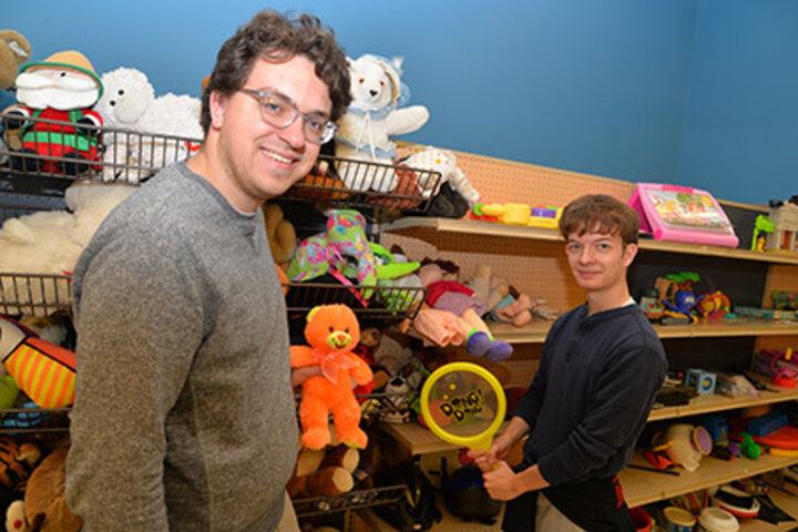 One service project took students to help organize merchandise at the People City Mission Help Center.