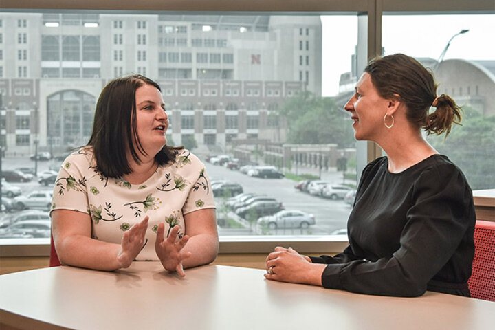 Van Duyn consults with Dr. Kasey Linde, assistant director of the teaching and learning center.